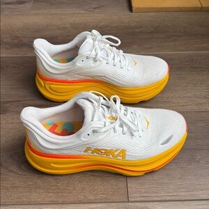 Hoka Bondi White and Yellow Athletic Shoes